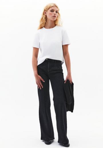 Клешеные джинсы