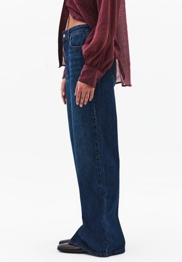 Клешеные джинсы