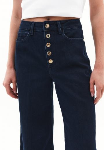 Клешеные джинсы