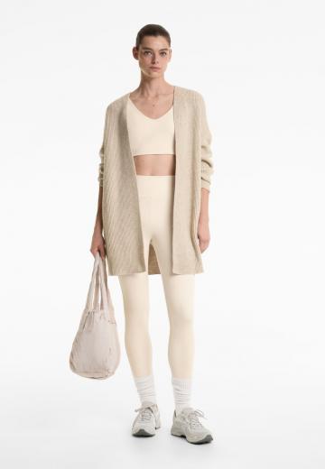 Длинный жилет