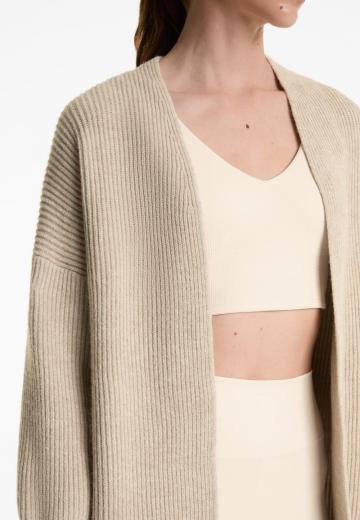 Длинный жилет