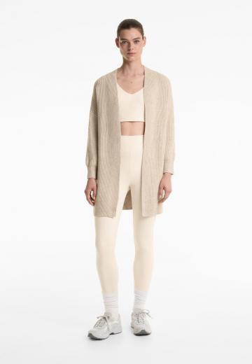 Длинный жилет