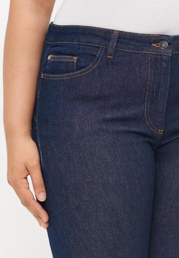 Клешеные джинсы