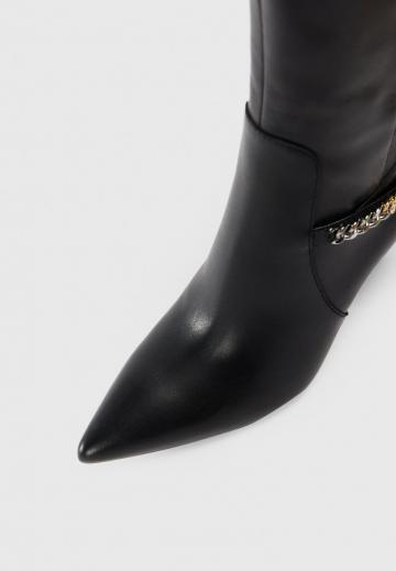 Высокие сапоги