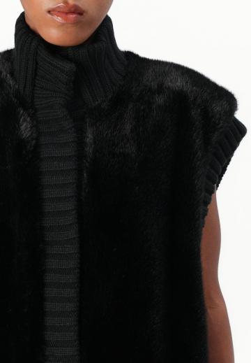 Пуховой жилет