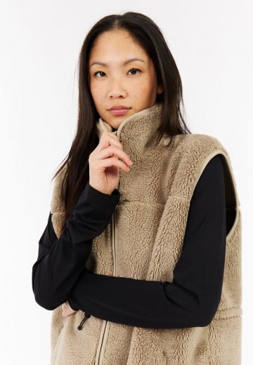 Длинный жилет