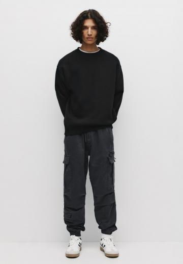 Брюки с накладными карманами