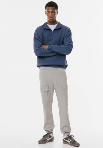 Брюки с накладными карманами