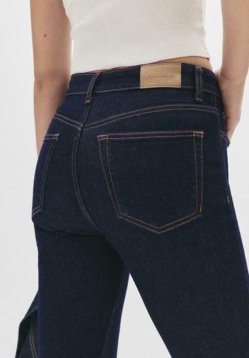 Клешеные джинсы