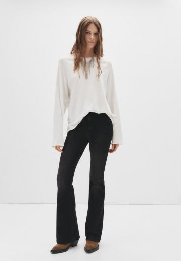 Клешеные джинсы