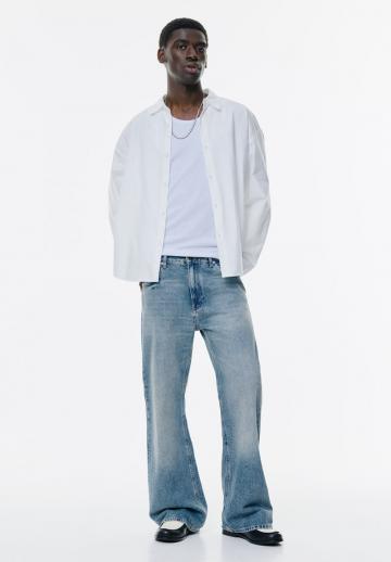 Клешеные джинсы