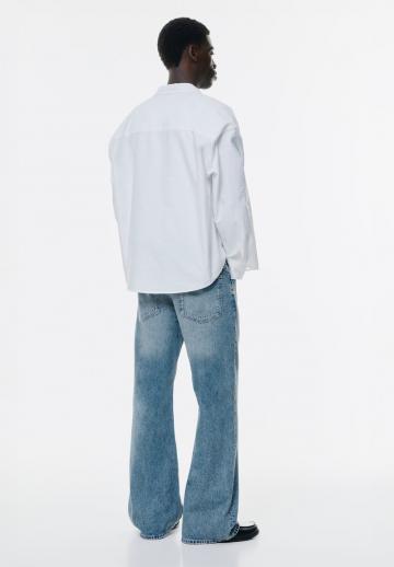 Клешеные джинсы