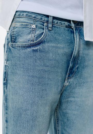 Клешеные джинсы