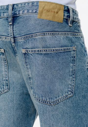 Клешеные джинсы