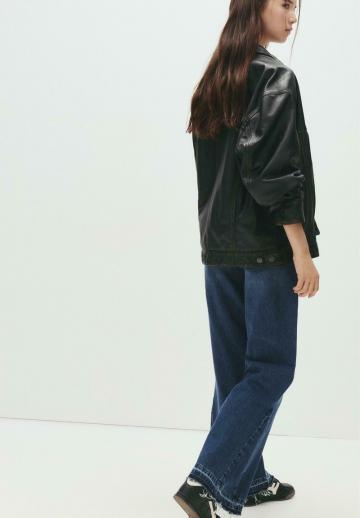 Клешеные джинсы