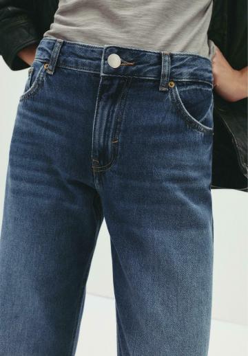 Клешеные джинсы