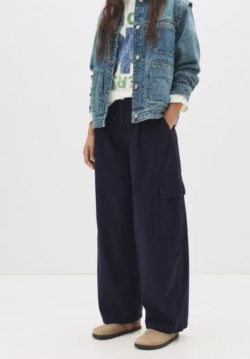 Брюки с накладными карманами