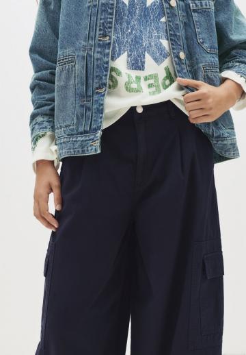 Брюки с накладными карманами