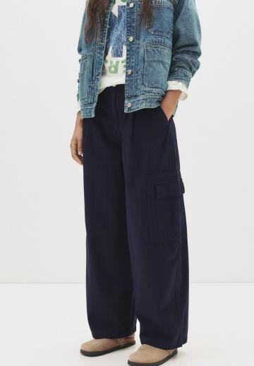 Брюки с накладными карманами