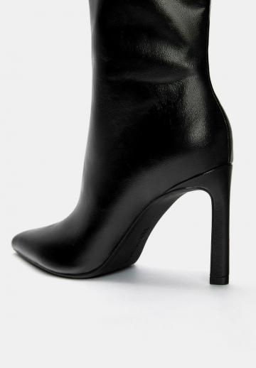 Высокие сапоги