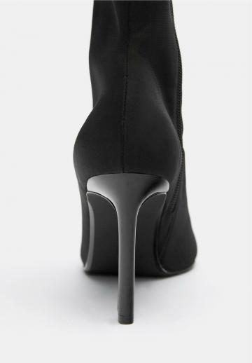 Высокие сапоги