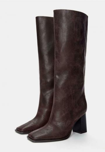 Высокие сапоги