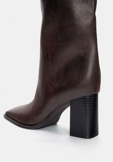 Высокие сапоги