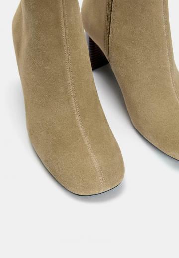 Высокие сапоги