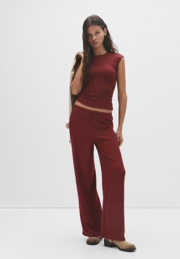 Блузка без рукавов