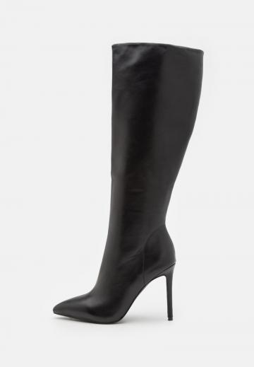 Высокие сапоги