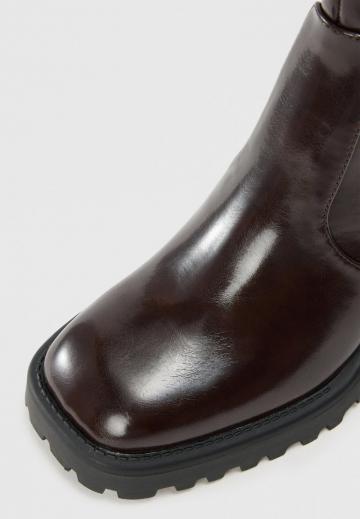 Высокие сапоги