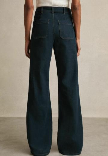 Клешеные джинсы