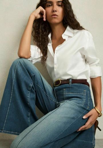 Клешеные джинсы