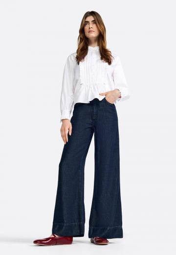 Клешеные джинсы