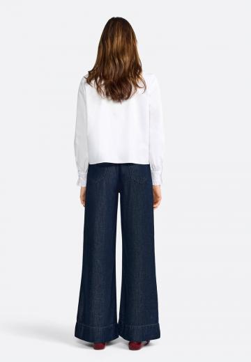 Клешеные джинсы