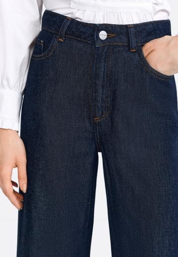 Клешеные джинсы