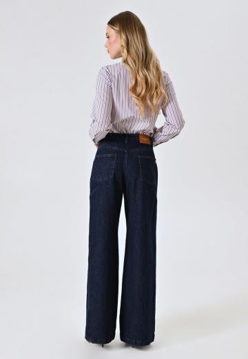 Клешеные джинсы