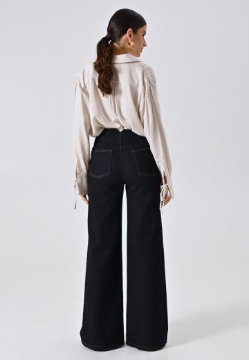 Клешеные джинсы