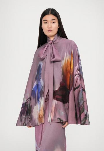 Блузка без рукавов