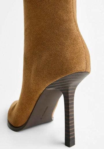 Высокие сапоги