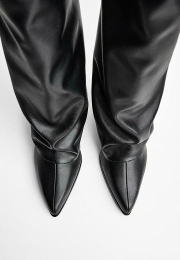 Высокие сапоги