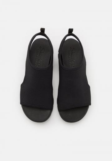 Босоножки на танкетке