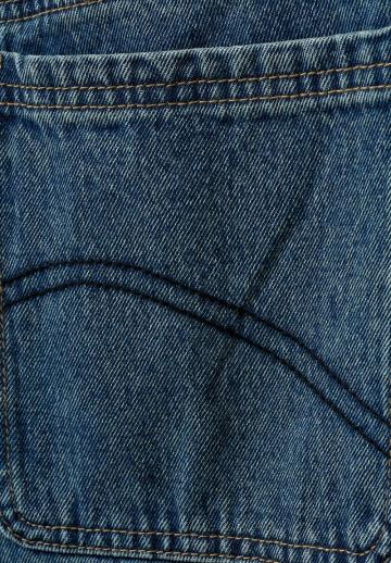 Клешеные джинсы