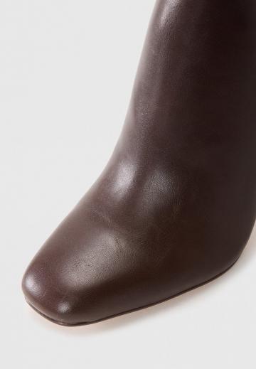 Высокие сапоги