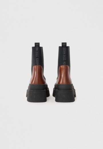 Сапожки на танкетке