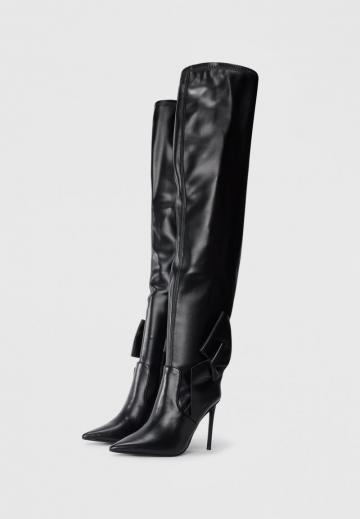 Высокие сапоги