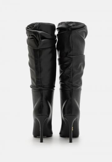 Высокие сапоги