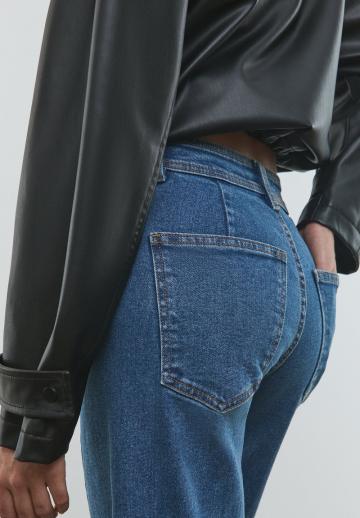 Клешеные джинсы