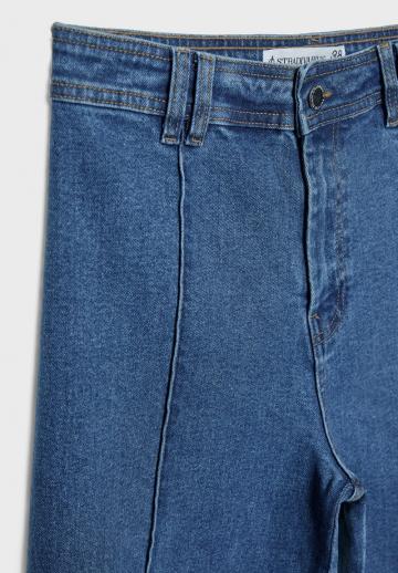 Клешеные джинсы