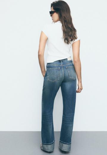 Клешеные джинсы